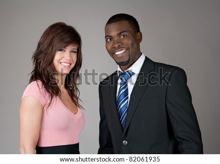 http://thumb1.shutterstock.com/display_pic_with_logo/78929/78929,1312236295,4/stock-photo-young-smiling-business-partners-caucasian-woman-and-african-american-man-82061935.jpg