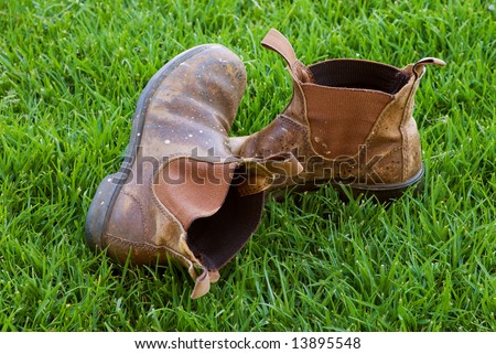 Battered Work Boots On Lawn Elastic Sided Boots Stock Photos Images Pictures