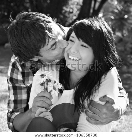 stock-photo-black-and-white-portrait-of-young-romantic-couple-106558730.jpg