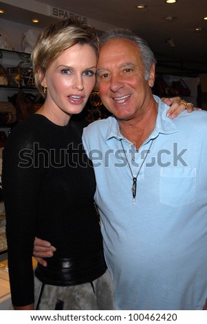  - stock-photo-kylie-bax-and-neal-cohen-at-the-launch-of-kylie-bax-and-spiros-poros-moro-moro-kids-boot-100462420