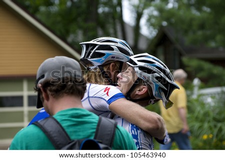  - stock-photo-stillwater-minnesota-june-teammate-sean-sullivan-congratulates-pro-cyclist-christian-helmig-105463940