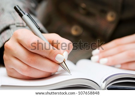 stock-photo-woman-writing-107658848.jpg
