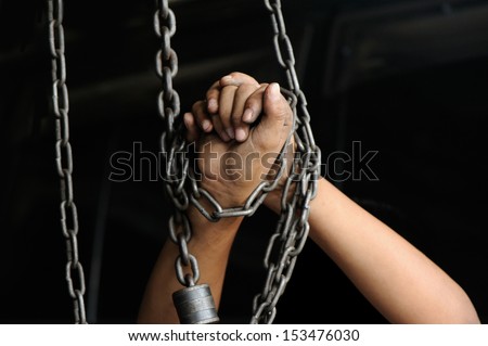 hands chained boundin shutterstock