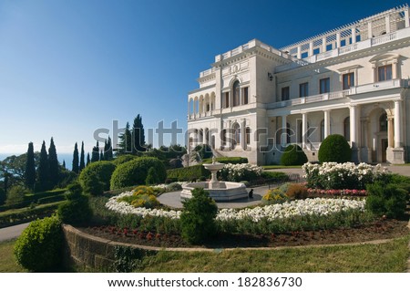Livadia Palace was a summer retreat of the last Russian tsar, Nicholas II, and his family in Livadiya, Crimea. Livadia Palace is situated against the blue sky background. - stock photo