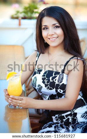 http://thumb1.shutterstock.com/display_pic_with_logo/913579/115681927/stock-photo-beautiful-young-happy-woman-in-cafe-with-fresh-orange-juice-stylish-sexy-lady-waiting-for-someone-115681927.jpg