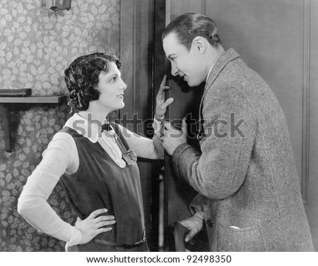 http://thumb1.shutterstock.com/display_pic_with_logo/921176/921176,1325278399,100/stock-photo-couple-talking-with-each-other-and-flirting-92498350.jpg