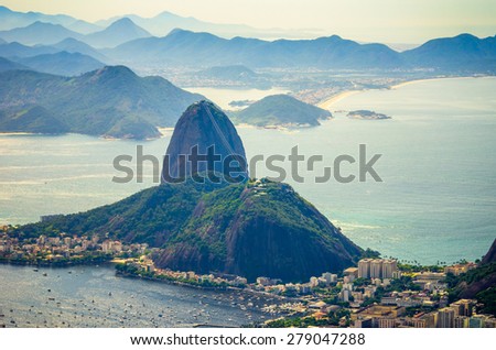 http://thumb1.shutterstock.com/display_pic_with_logo/93635/279047288/stock-photo-rio-de-janeiro-brazil-sugarloaf-mountain-and-other-mountains-in-background-filtered-view-279047288.jpg