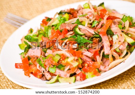 salad tortellini with tomato ham and omelette with mushrooms and