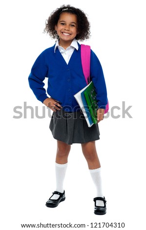Girl in smart uniform holding notebook and calculator in hand and ... Girl in smart uniform holding notebook and calculator in hand and ...