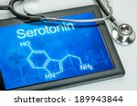 Small photo of Tablet with the chemical formula of serotonin