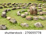 circle of rocks in the green...