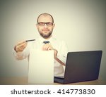 stock-photo-please-sign-here-portrait-man-in-formalwear-stretching-out-clipboard-with-paper-and-pointing-it-414773830.jpg