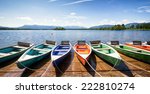 row boats at a lake