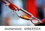 Small photo of Climbing sports image of a carabiner on a rope