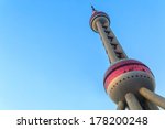oriental pearl tower with blue...