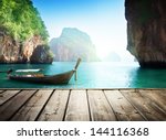 adaman sea and wooden boat in...
