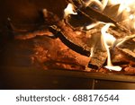 Small photo of Crackling fire on a summer night