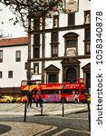 Small photo of Funchal, Portugal - february 22 2018 : touristy bus in the city centre