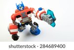 Small photo of Kuala Lumpur, Malaysia - June 6, 2015: Figure toy of Playskool Optimus Prime from the Autobots Rescue Bots cartoon. Optimus Prime is Autobots Transformers leader on Earth within Fire Station Prime