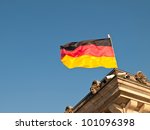 german flag flying over...