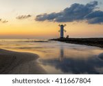 seascape  lighthouse during an...