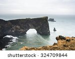rock arch at dyrholaey coast ...