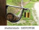 photo of a golden padlock at...