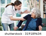 Small photo of Care Worker Mistreating Senior Woman At Home