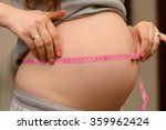 Small photo of Separate volume measurement pregnant belly