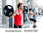 group with dumbbell weight training equipment on sport gym - stock photo