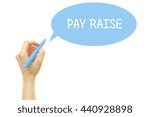 Small photo of Woman hand writing PAY RAISE word with a marker isolated on white.