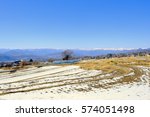 Small photo of Japanese winter agricultural district and snow-covered mountain chain of mountains