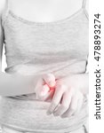 Small photo of Acute pain in a woman finger isolated on white background. Clipping path on white background
