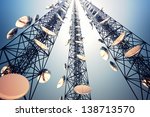 three tall telecommunication...