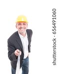 Small photo of Portrait of architect smiling and talking picture with selfiestick wearing yellow hardhat isolated on white background
