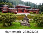 gray buddha statue in front of...