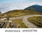 Small photo of White sea of clouds on horizon and three round tops of mountain with pathway in foreground. Snezka hill, Giant mountains (Krkonose), Czech republic.