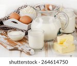 Small photo of Fresh Milk products on a wooden background. Selective focus