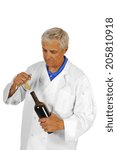 Small photo of Sommelier uncorking a bottle of wine