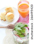 Small photo of New yorker food, jar salad and carrot juice with bread for healthy breakfast image