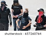Small photo of Protesters acting out at the Act for America Rally in Denver, Colorado on June 10, 2017.