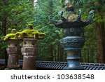stone lanterns at toshogu...