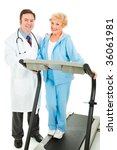 Healthy senior woman on a treadmill, standing beside her doctor. Isolated on white. - stock photo