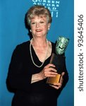 Small photo of 22FEB97: Actress ANGELA LANSBURY with her Screen Actors Guild Life Achievement Award. Pix: PAUL SMITH