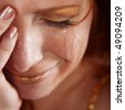 stock photo : Closeup of crying woman with tears
