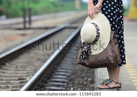 Image result for woman waiting for the train