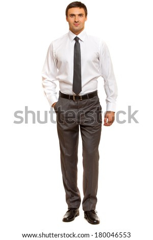 Man wearing white dress shirt standing sideways. Man wearing white dress shirt standing sideways.