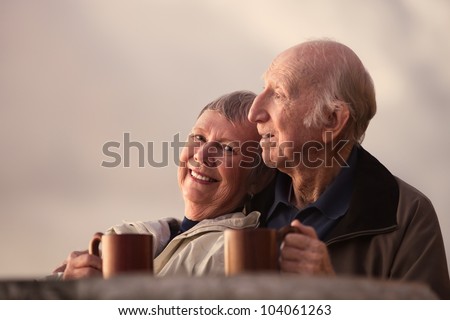 https://thumb1.shutterstock.com/display_pic_with_logo/102804/104061263/stock-photo-smiling-mature-woman-with-husband-in-outdoors-scene-104061263.jpg