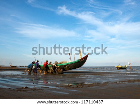 fishing boats under sun