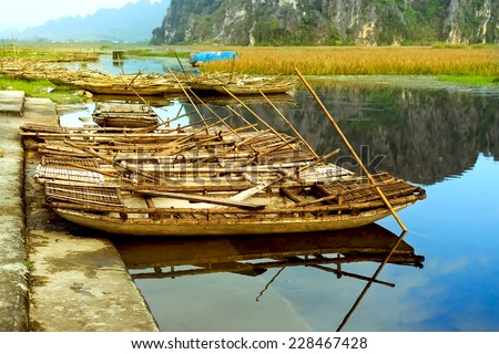 Landscape with boat in Van Long natural reserve in Ninh Binh, Vietnam